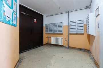 mailboxes in the lobby of an apartment building