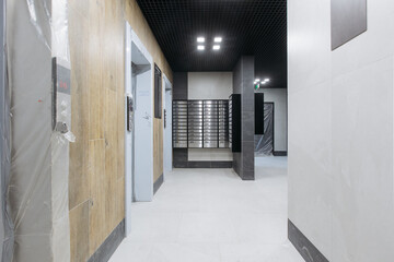 mailboxes in the lobby of an apartment building