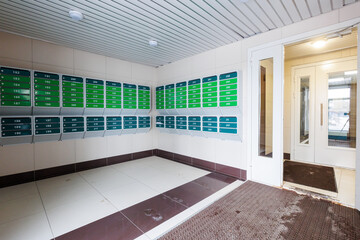 mailboxes in the lobby of an apartment building