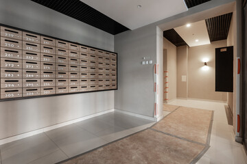 mailboxes in the lobby of an apartment building