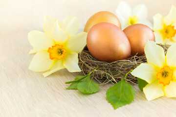 Home interior with easter decor.spring flowers, egg on a light background