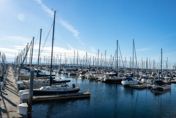 Fototapeta premium Seattle, Washington local harbor with lots of boats at docks and moorings 