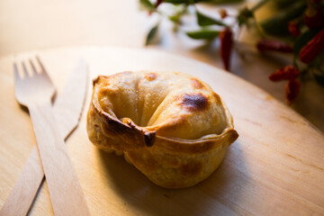 Argentinian empanada with repulge fatay style.
