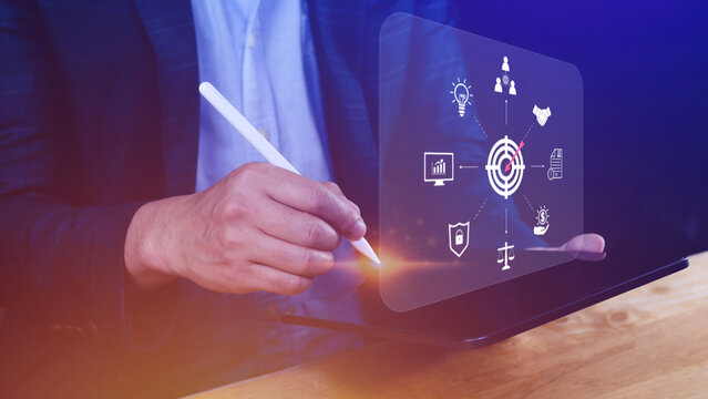 Hand pointing the icon virtual screen of Digital target marketing advertising and sales increase business technology concept, online marketing, E-business, Ecommerce, Business online.