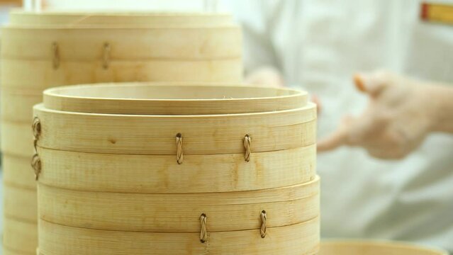 selective focus of chef making chicken momo dumpling 