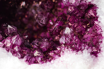 artificially stained (painted) quartz to look like an amethyst. pink, purple, violet, macro detail...