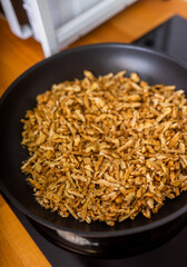 close up of walnuts in a pan
