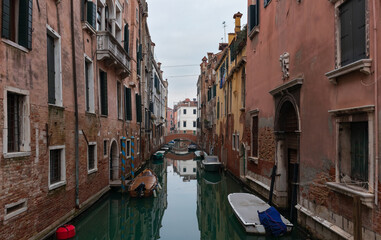 Obraz na płótnie Canvas Venice italy, street with canal and boats