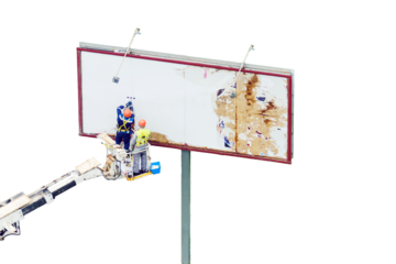 Workers upgrading billboard outdoor, on roadside of city street, isolated on a white background
