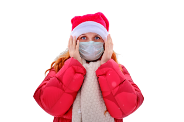 A frightened woman holds her head in a medical face mask, a winter park with trees in the snow, isolated on a white background