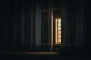 Light shines through a single royal palace window - London, UK - Landscape