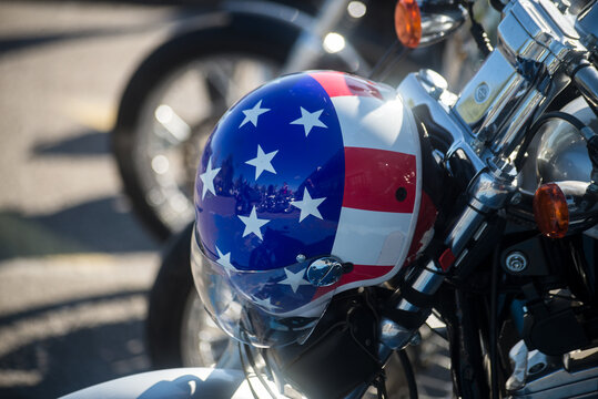 Mulhouse - France - 11 september 2022 - Closeup of printed american flag on helmet of Harley Davidson motorbike