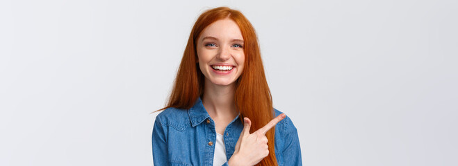 Close-up portrait outgoing good-looking cheerful redhead teenage girl in casual outfit, laughing...