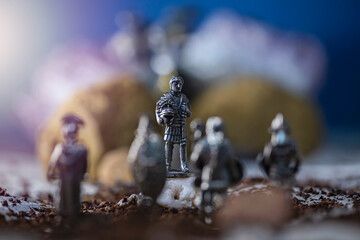 Roman soldier figurines.Small metal warrior figurines posed in small cinematic...
