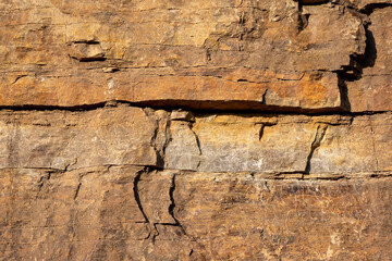 Stone texture detail, close up shot of rock surface for background and design.