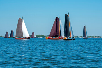 Fototapeta premium Traditional Frisian wooden sailing ships in a yearly competition in the Netherlands