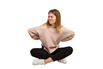 Fototapeta premium Young caucasian woman sitting on the floor cutout isolated