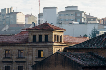 Telephoto photograph of a residential area in the historic center of the small Castilian city of Salamanca. View at early morning