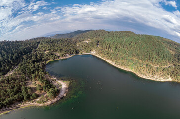 Panoramic view of the Iturbide Dam in the middle of the forest on a sunny day in the State of Mexico, Mexico