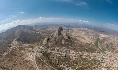 Panoramic view of Peña de Bernal, at the foot of the mountain the magical town of Bernal in Queretaro, Mexico