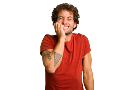 Young curly smart caucasian man cut out isolated biting fingernails, nervous and very anxious.