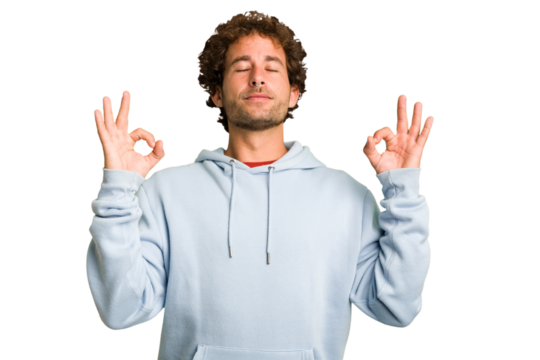 Young curly smart caucasian man cut out isolated relaxes after hard working day, she is performing yoga.