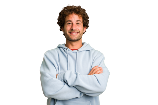 Young curly smart caucasian man cut out isolated who feels confident, crossing arms with determination.