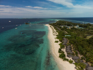 Aerial photo of beautiful paradise Maldives tropical beach on island.