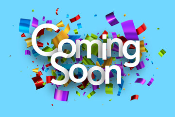 Coming soon with colorful cut out foil ribbon confetti on blue background.