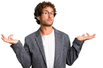 Young curly smart caucasian man cut out isolated doubting and shrugging shoulders in questioning...