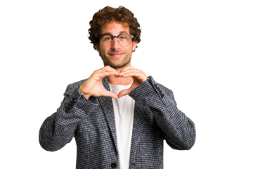 Young curly smart caucasian man cut out isolated smiling and showing a heart shape with hands.