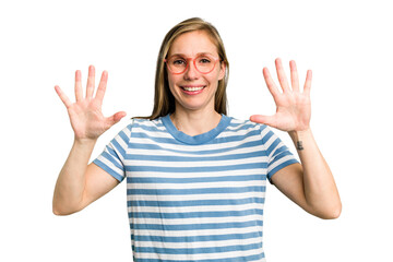 Young caucasian woman cutout isolated showing number ten with hands.