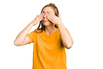 Young caucasian woman cutout isolated afraid covering eyes with hands.