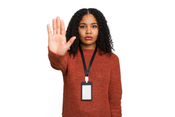 Young african american woman with ID card isolated standing with outstretched hand showing stop sign, preventing you.