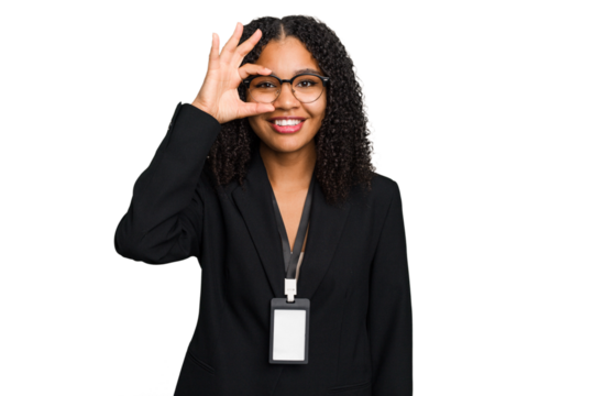 Young african american business woman with ID card isolated excited keeping ok gesture on eye.