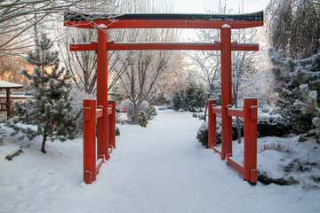 Japanese garden in a landscape park in winter. A place of rest, relaxation in a big city.