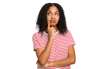 Young african american woman with curly hair cut out isolated contemplating, planning a strategy,...