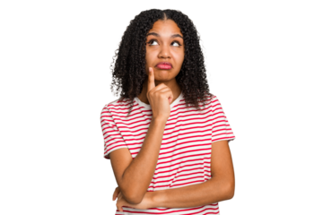 Young african american woman with curly hair cut out isolated contemplating, planning a strategy, thinking about the way of a business.
