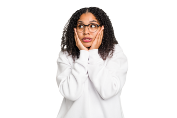 Young african american woman with curly hair cut out isolated scared and afraid.