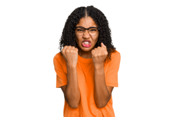 Young african american woman with curly hair cut out isolated upset screaming with tense hands.