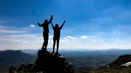 couples having a good time in nature have a successful trip together
