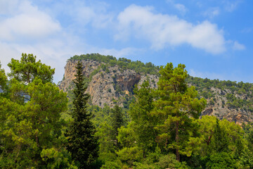 Fototapeta na wymiar Turkish Taurus Mountains in the Kemer region of Antalya province. Background with copy space