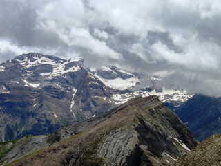 mountainous landscape of the Spanish Pyrenees. lots of green vegetation and high mountains.