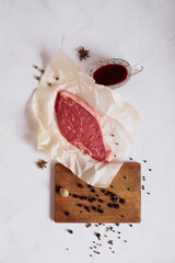 Flatlay raw steak and marbled beef