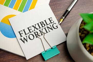 FLEXIBLE WORKING text on a paper sticker and charts