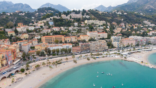 Aerial view on coast, marina and buildings in old Town Menton, France. Drone photo. High angle view of town