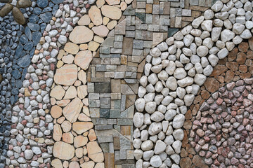 Pebble stone wall texture background or texture, close up