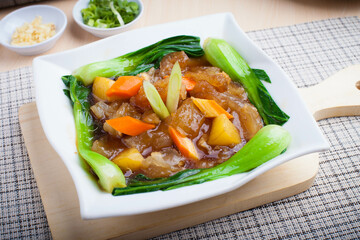 Photo of stir-fried beef tendon with sauce, this dish is a typical Asian food