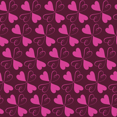seamless pattern of intertwined floral heats in pink an burgundy 