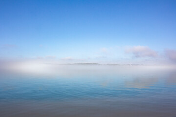 Fototapeta na wymiar Island in the fog